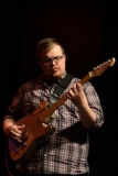 Library_061115_DB_BrandonGuitar1